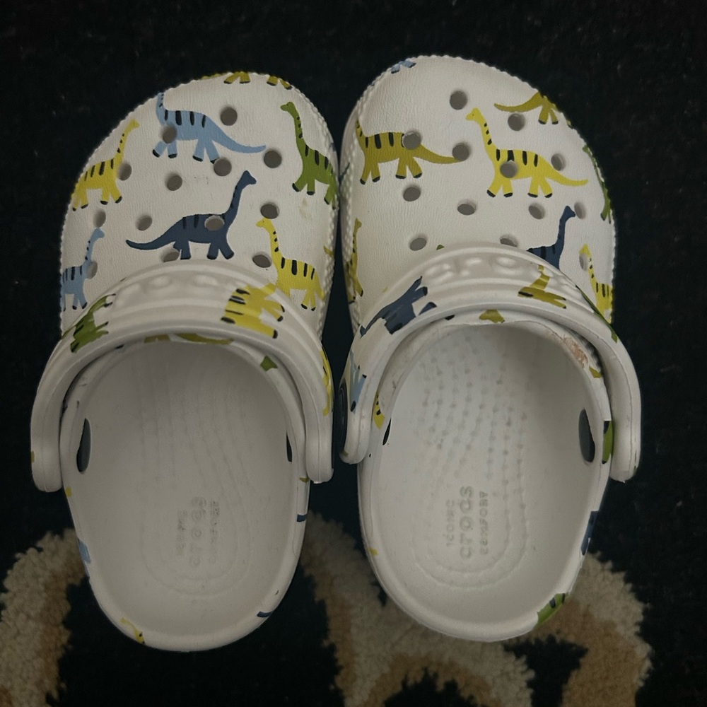 CROCS Kids Dinosaur Print Clogs - White and Multicolor